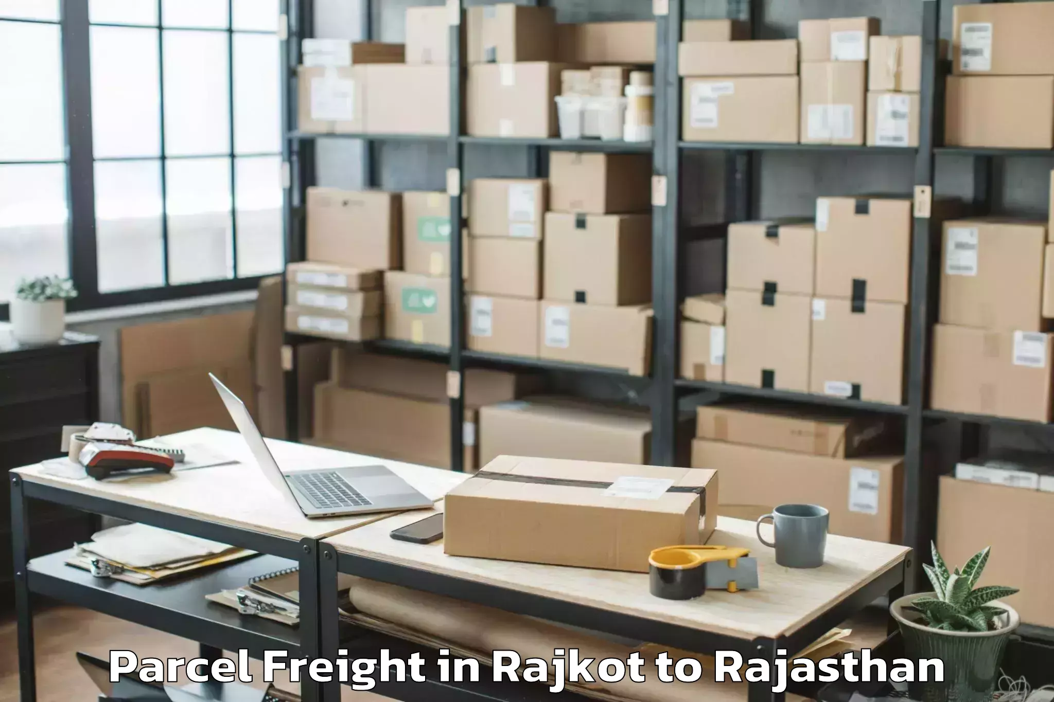 Expert Rajkot to Maulana Azad University Jodhpu Parcel Freight